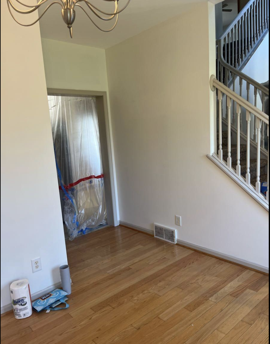 Entryway prep with stairwell, ready for paint